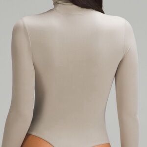 Lululemon Nulu Turtleneck Bodysuit in Riverstone